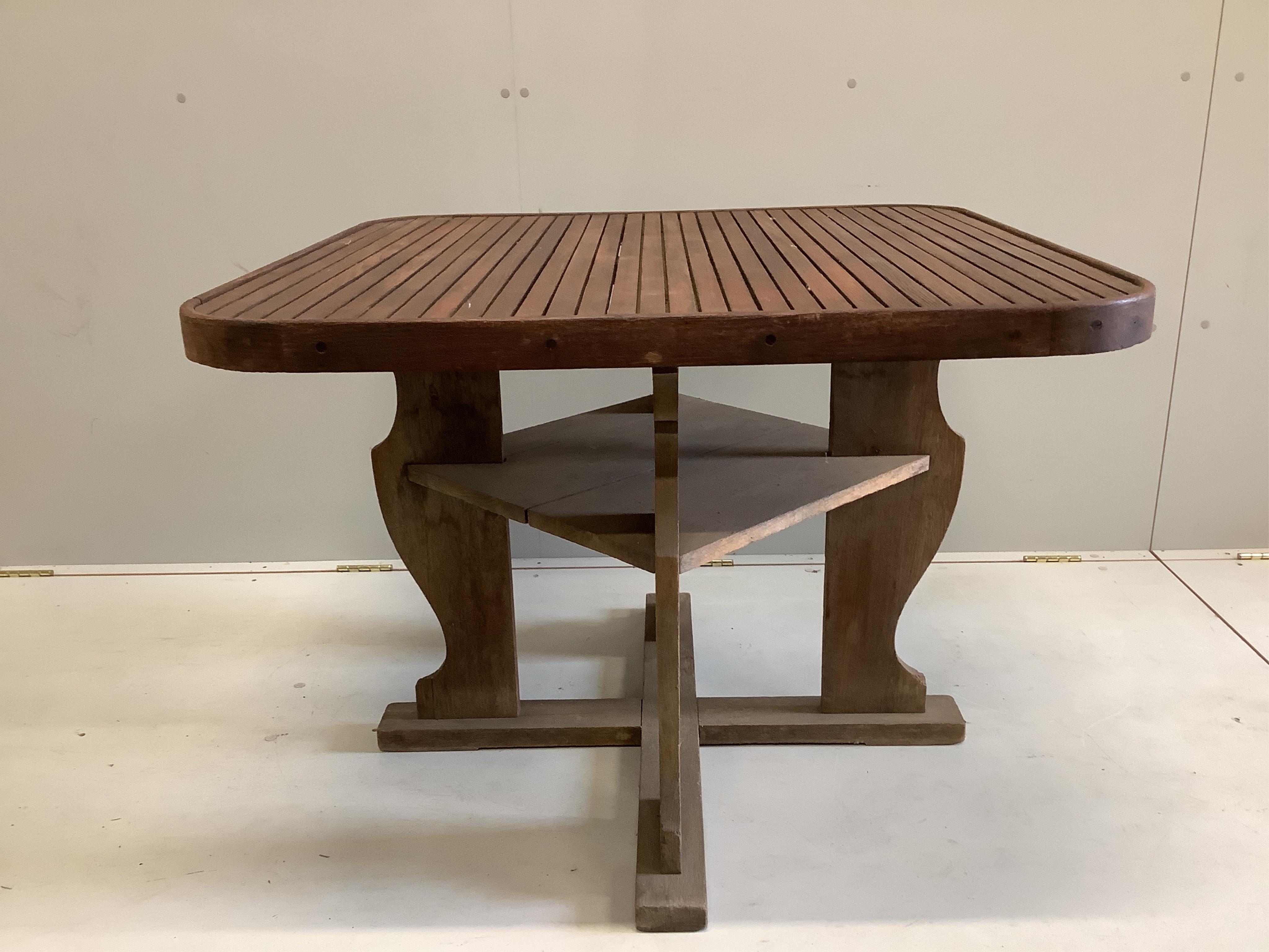 Hughes Bolckow for Heals, a square teak garden table, width 102cm, height 70cm and four chairs